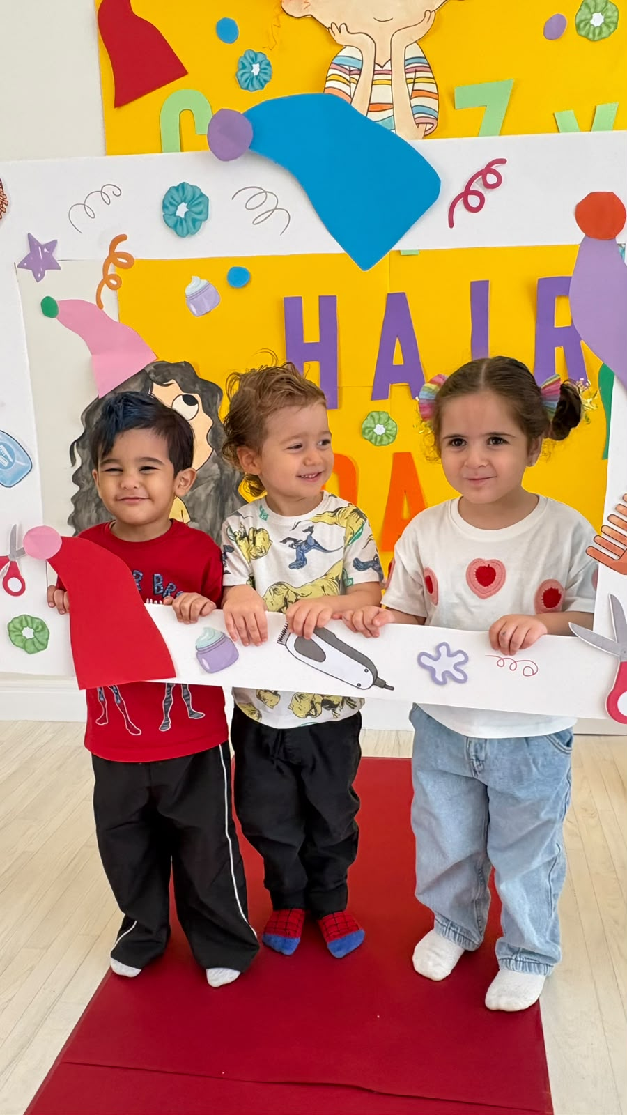 Three children at salon activity day